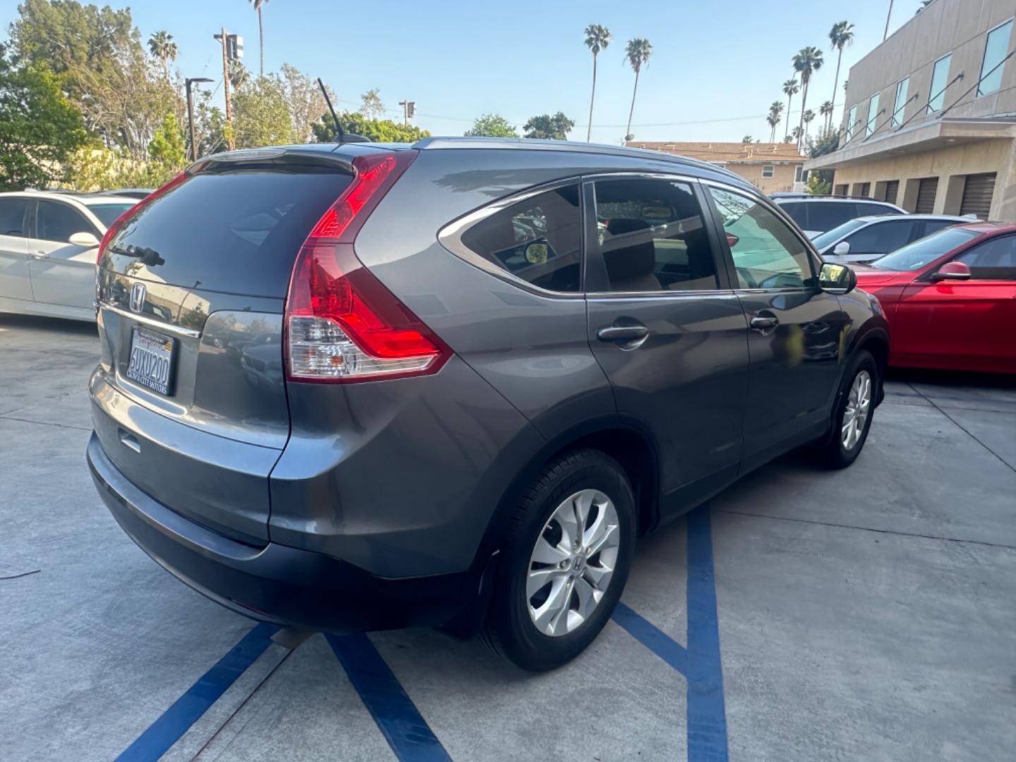 2012 Grey /Gray Honda CR-V EX-L 2WD 5-Speed AT (JHLRM3H78CC) with an 2.4L L4 DOHC 16V engine, 5-Speed Automatic transmission, located at 30 S. Berkeley Avenue, Pasadena, CA, 91107, (626) 248-7567, 34.145447, -118.109398 - Moon-roof! Leather seats! This 2012 Honda CR-V EX-L 2WD 5-Speed AT looks and drives good. - Photo#4